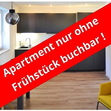 Hotel-Garni 'Zum Weinkrug' Зомерхаусен Екстериор снимка